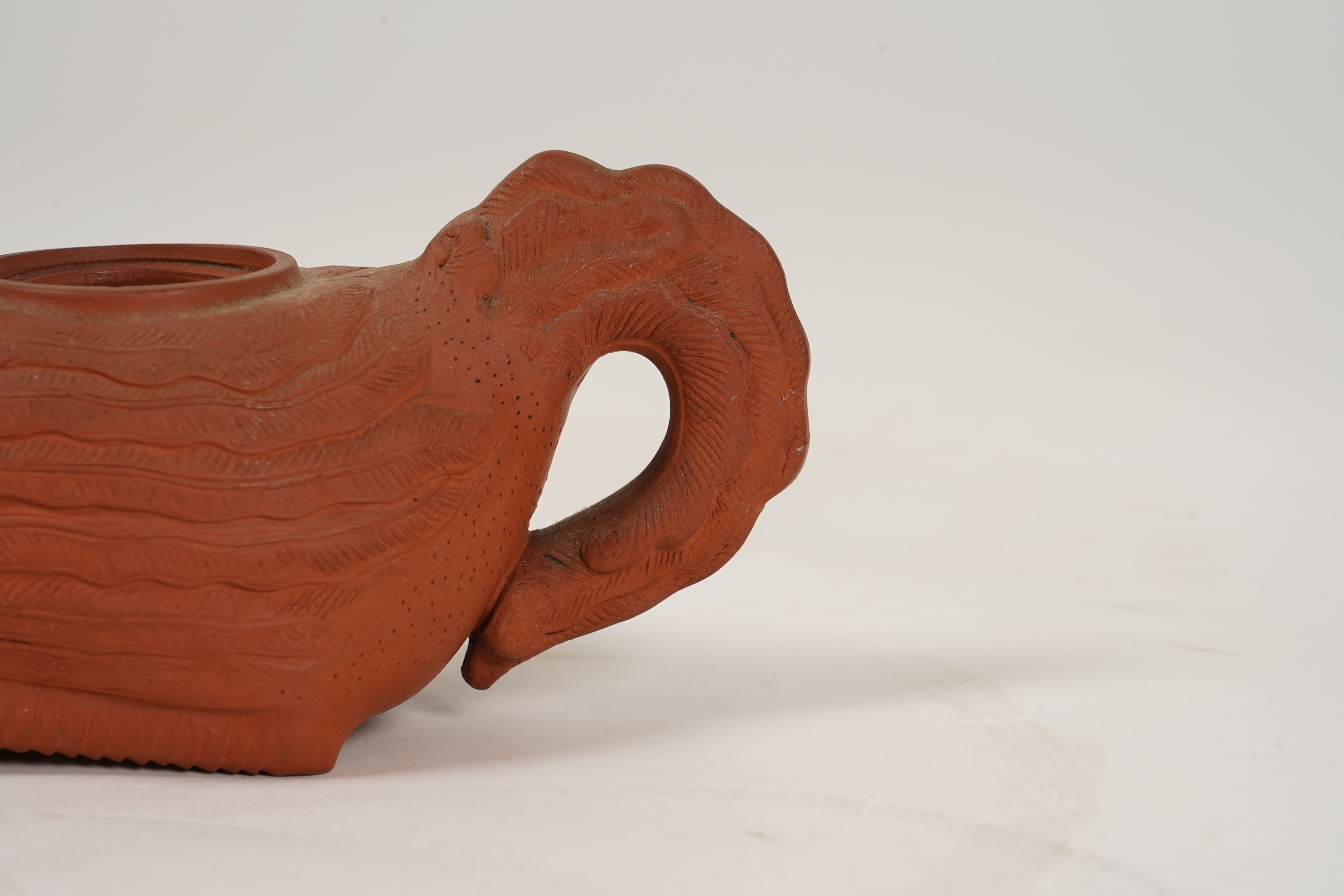 A Chinese Yixing 'Phoenix' teapot, late Qing dynasty